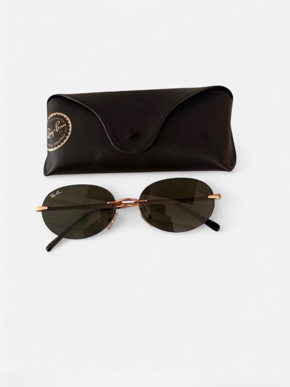 Ray-Ban Gold Frame Oval Sunglasses with Dark Brown Lenses
